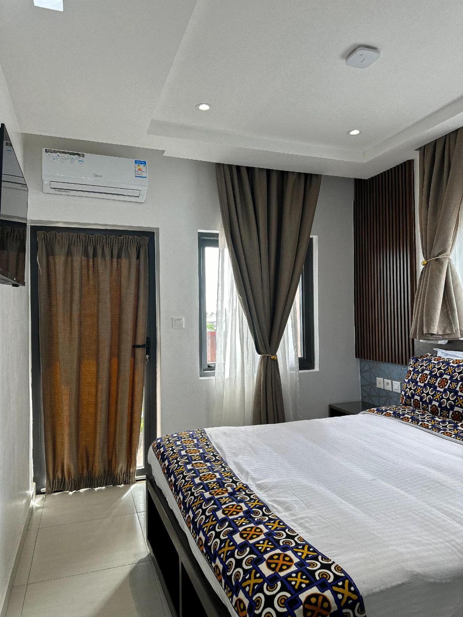 Klik Klak Appart Hotel Cotonou Bagian luar foto